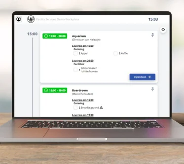 Laptop met een scherm waarop een reserveringsoverzicht van Reflex voor vergaderruimtes wordt weergegeven.
